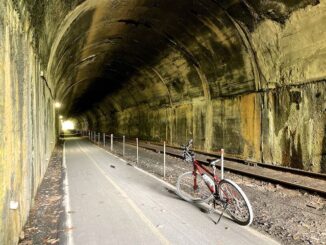 Brush Tunnel: Signs warn to stay trailside of the fence, walk your bike though, and not to enter Brush Tunnel with an oncoming train. Did, did not, and would have. (No way I'm missing that shot!)