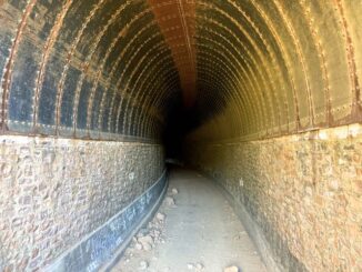 Johnson Canyon Railroad Tunnel. It's steel plate ceiling replaced the original wood trusses, which burned in 1898.