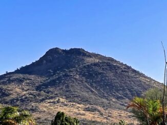 Ludden Mountain, viewed from 67th Ave. My intended route, was from the knob on the left, up & right along the lighter band, to the top of the lower black mass, then a left turn to the summit.