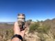 Enjoying a hiking beer atop Sunrise Peak. (That palo verde is the high point.)