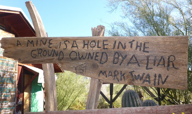 Sign outside the Blue Bird Cafe: "A mine is a hole in the ground owned by a liar." (Mark Twain)
